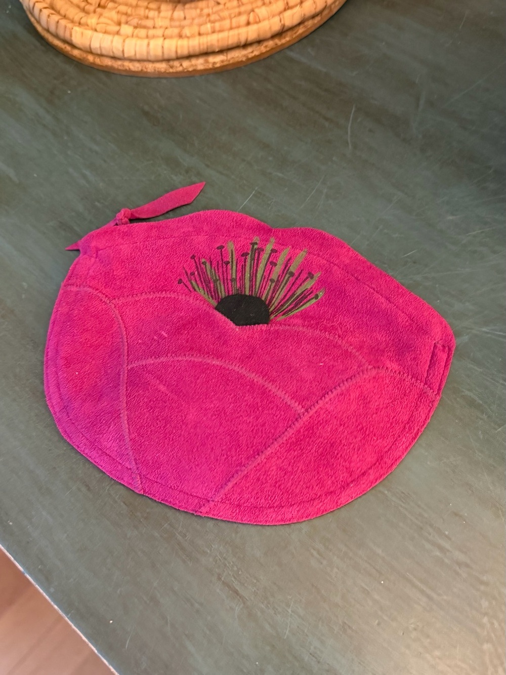 Maurice Keyloun New York magenta cosmetic pouch with zipper closure.